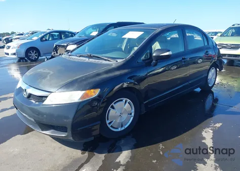 2010 Honda Civic Hybrid from USA, damaged, VIN JHMSA3F21AS005780